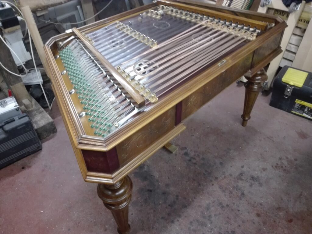 Renewed original Bohák cimbalom, made in 1914, it was made by older Bohák Lajos with rosette rezonance