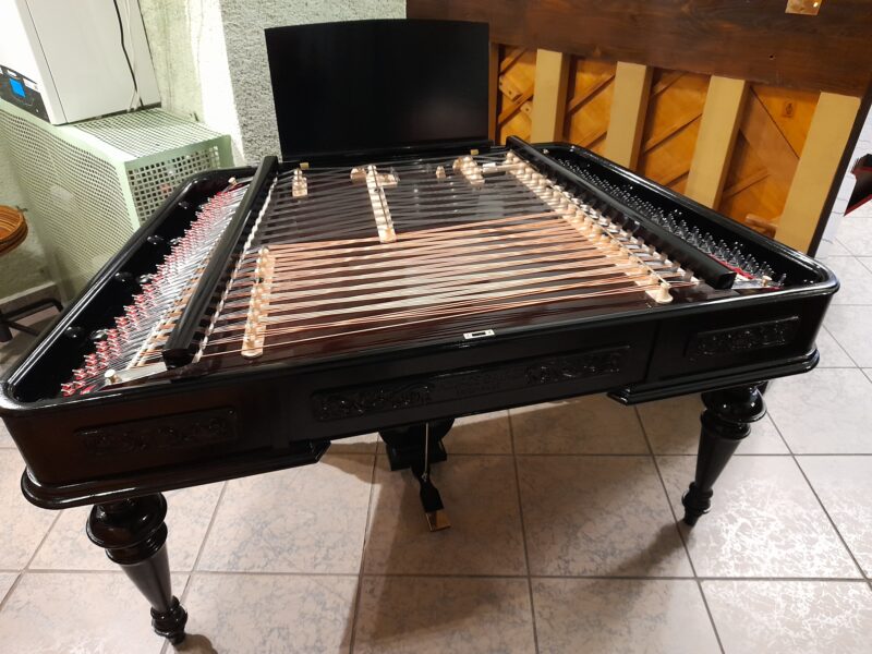 Carved cimbalom in black colour, with hand made politur