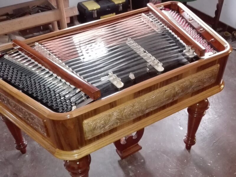 Carved cimbalom in walnut colour, with handmade politur